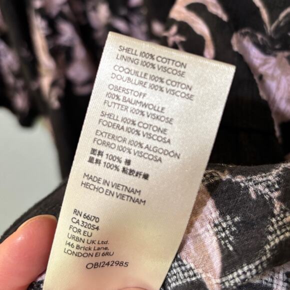 Free People NWT Sunbaked Ruffled Swing Tiered Mini Dress Washed Black Floral L - Picture 9 of 10